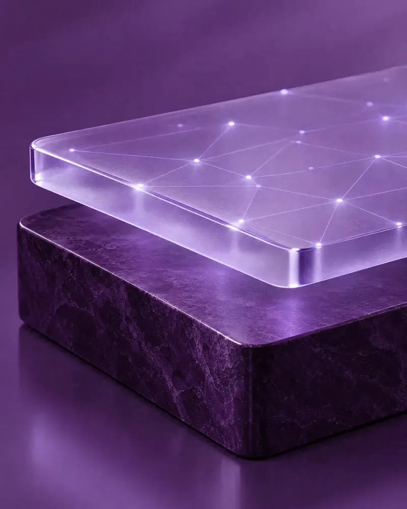 A thin layer of glowing glass, traced with a fine network of light, resting just above a solid slab of stone.